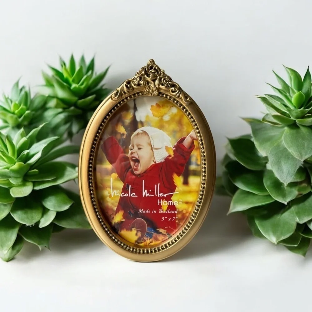 Nicole Miller elegant oval